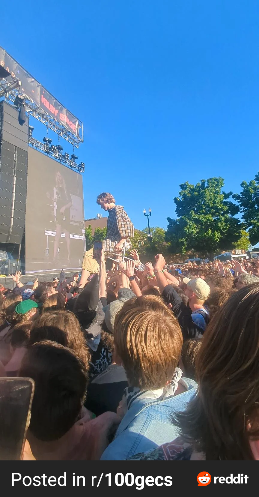 nerd on chair over crowd